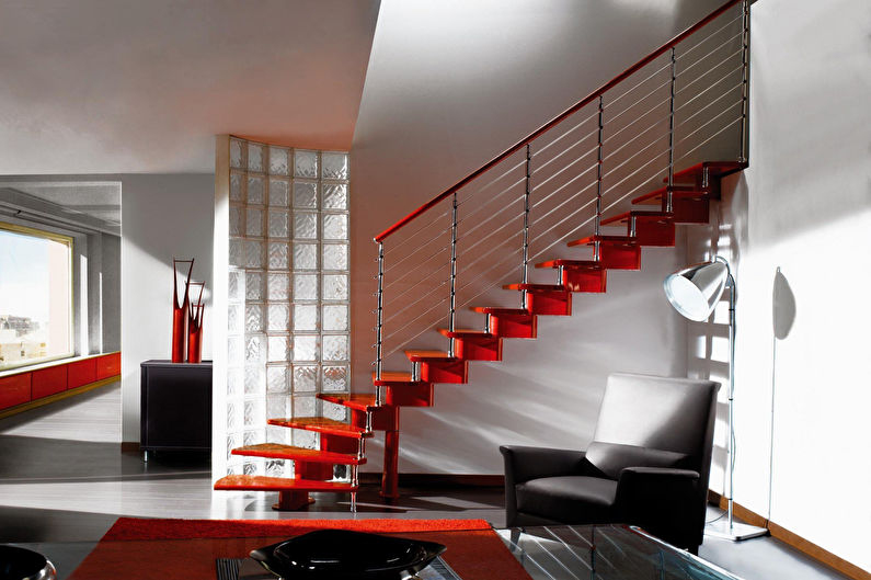 a modern staircase in a living room.