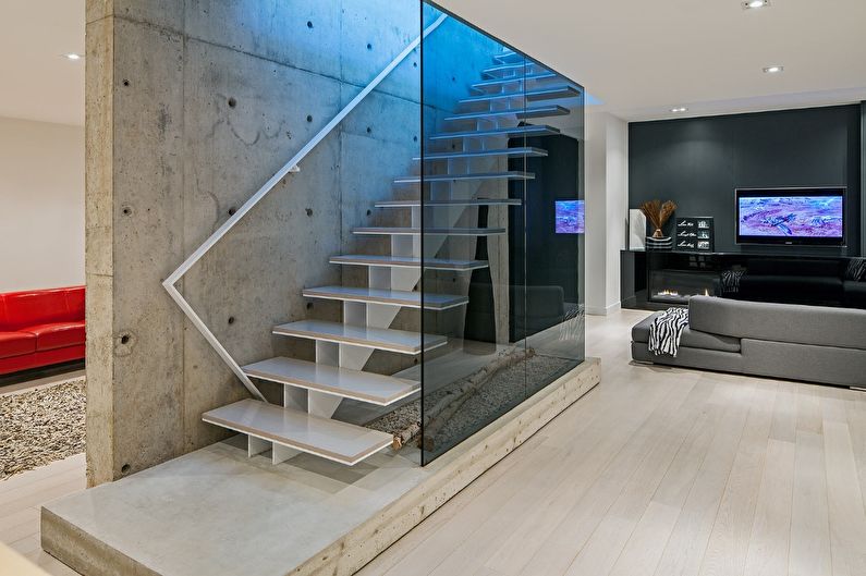 a concrete staircase in a modern living room.