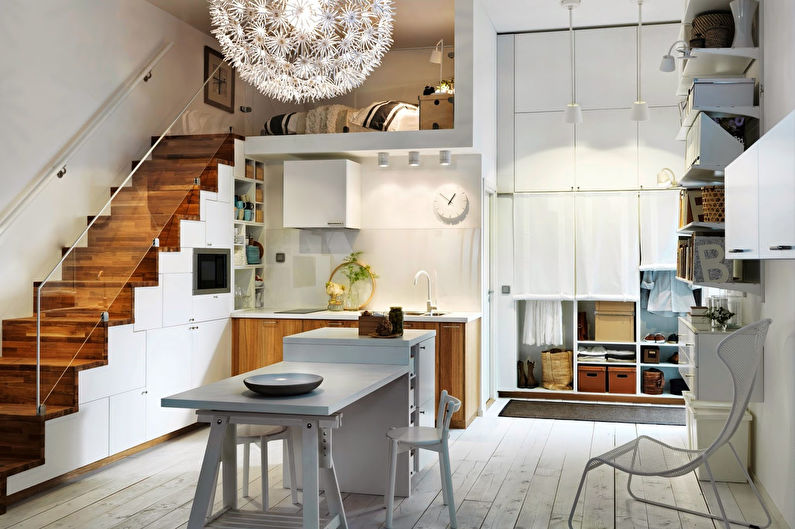 a kitchen and dining area in a small apartment.