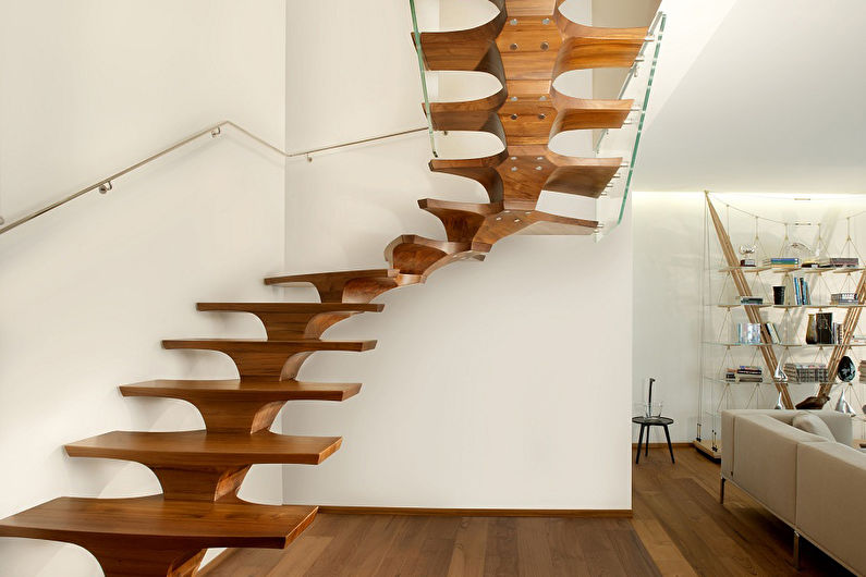 a wooden staircase in a living room.