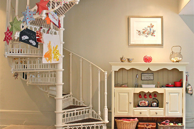 a white spiral staircase in a room.