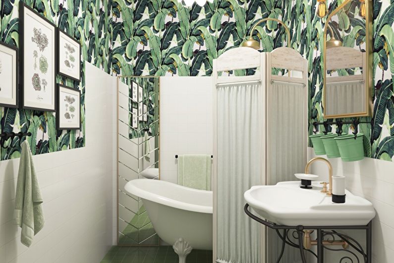 a bathroom with green and white wallpaper.