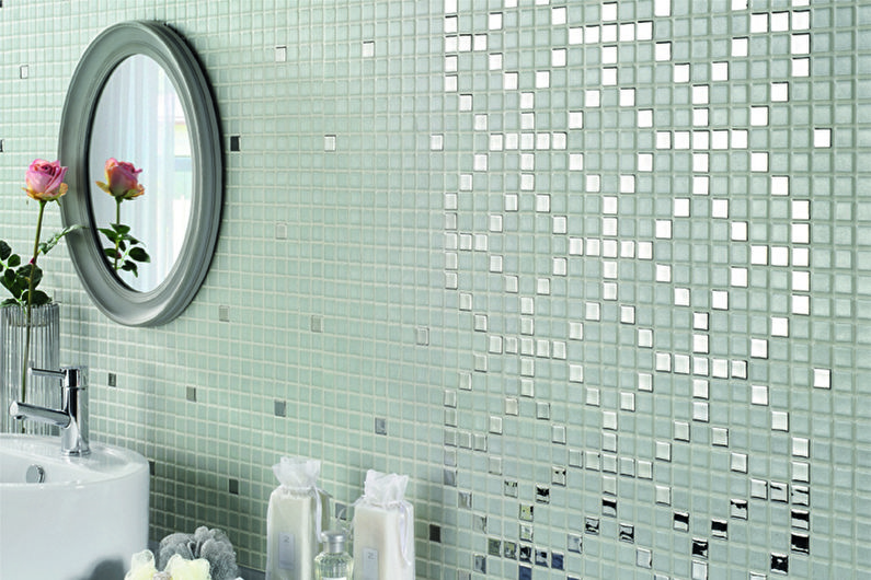 a bathroom with a mirror, sink and mirror.