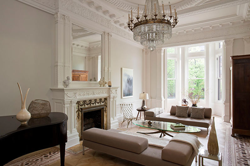 a living room with a fireplace and a piano.