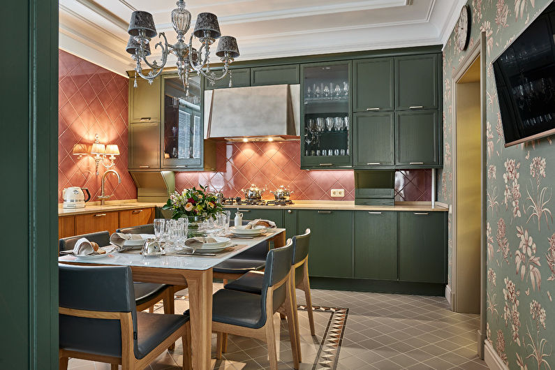 a dining room with a table and chairs.