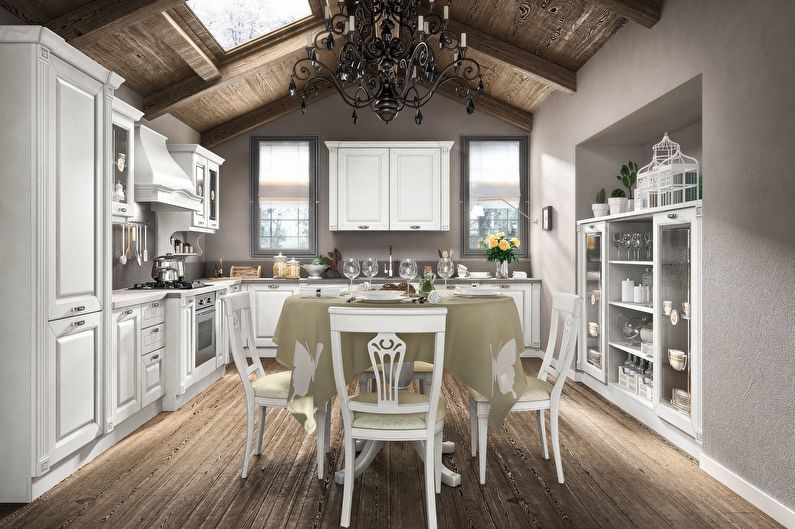 a white kitchen with a wooden ceiling.