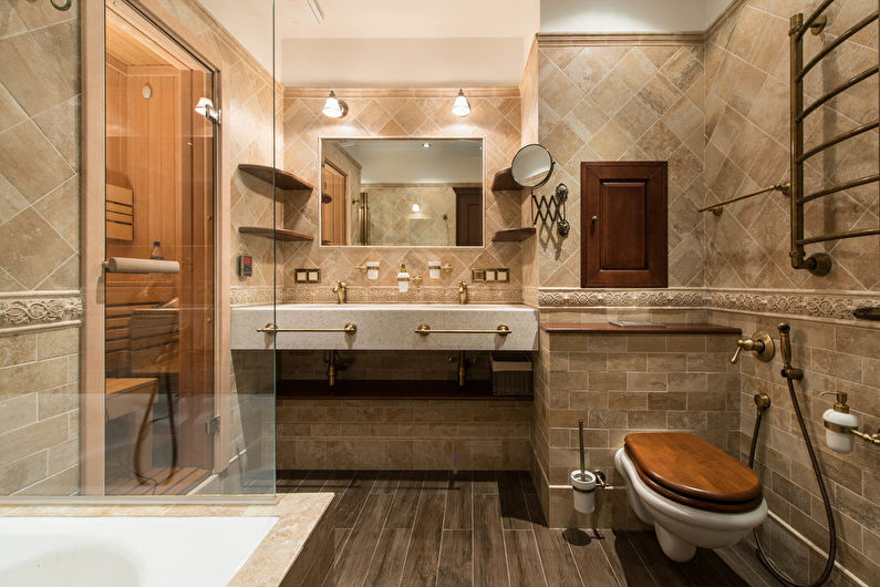 a bathroom with a toilet, sink, and shower.