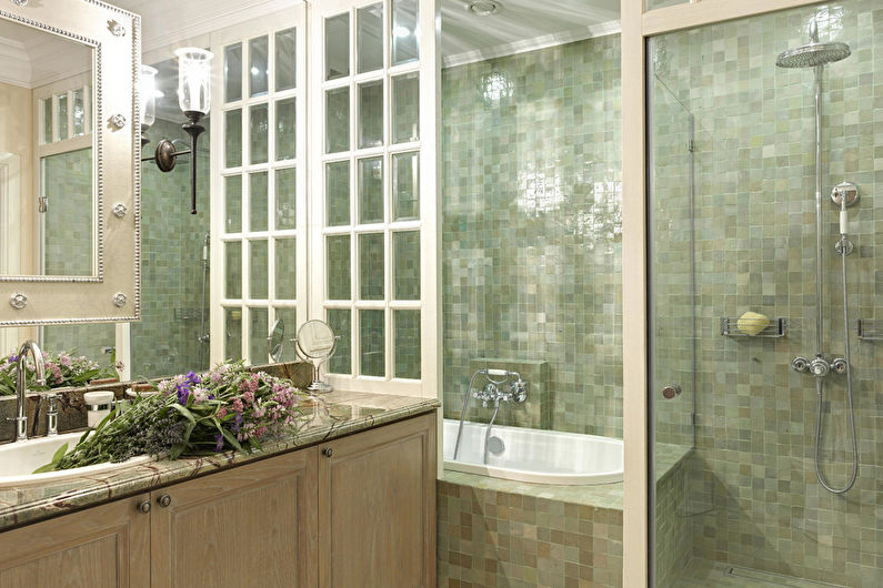 a bathroom with a sink and a shower.