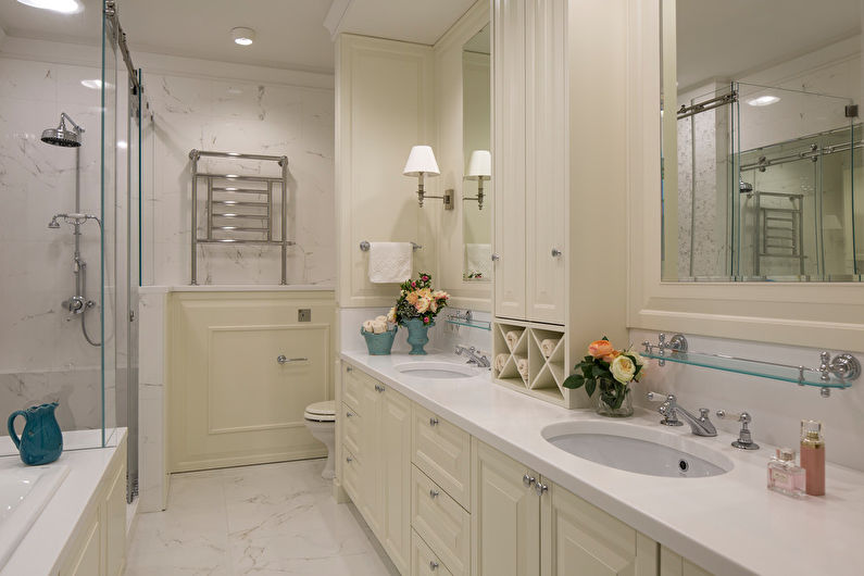 a bathroom with two sinks and a bathtub.