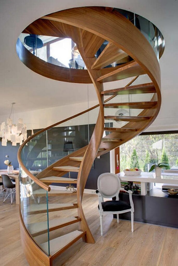 a spiral staircase in a living room.