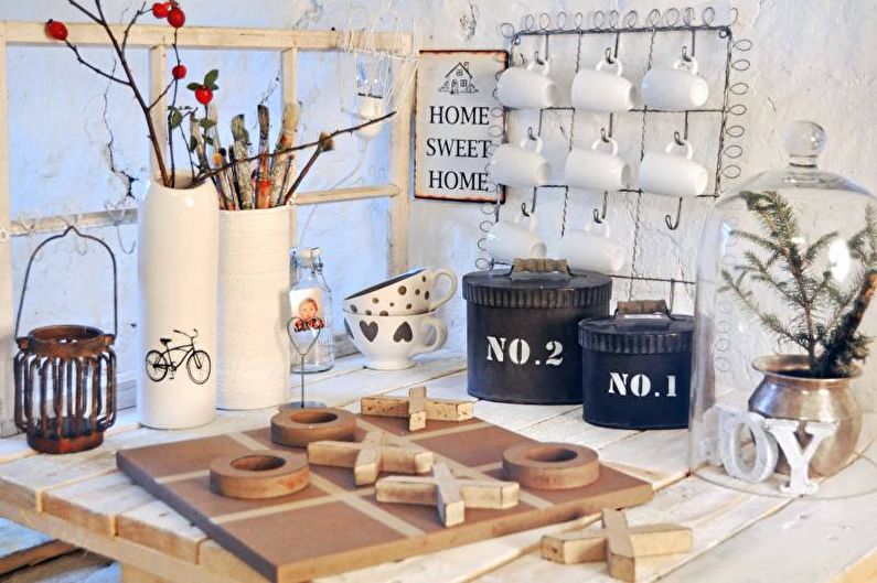 a table with various items on it, including vases and a clock.