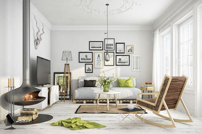 a white living room with a rocking chair and a fireplace.