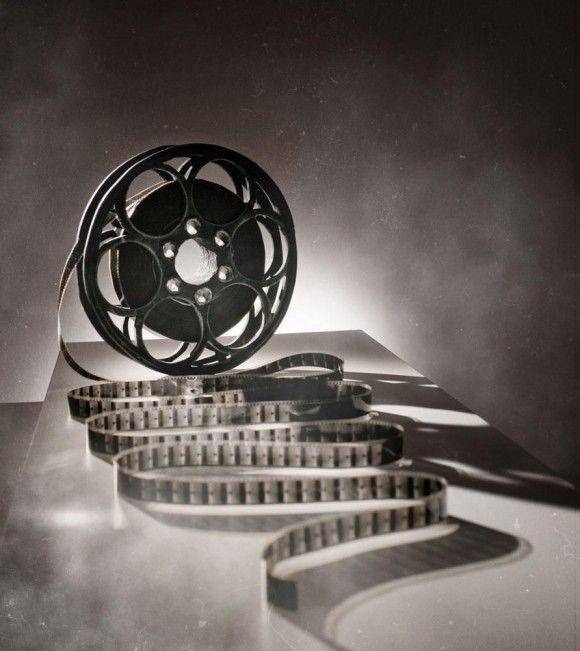 a black and white photo of a film reel.