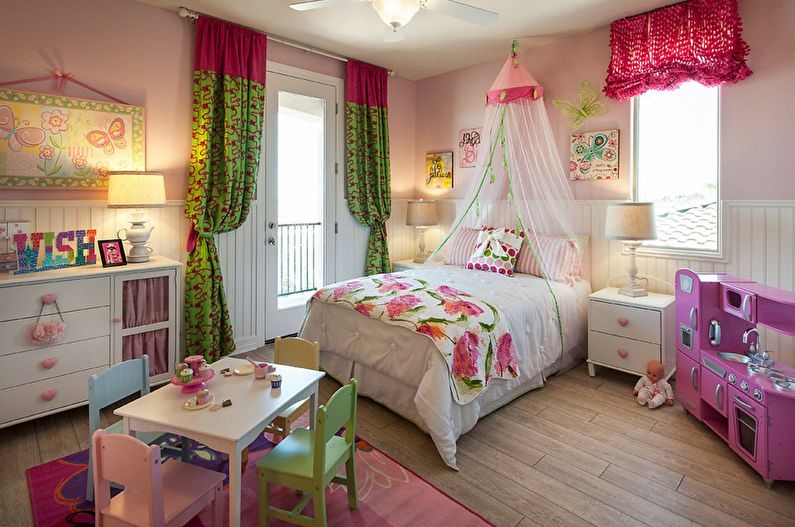 a girl's bedroom decorated in pink and green.