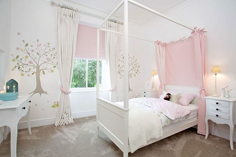 a girl's bedroom with a pink canopy bed and white furniture.