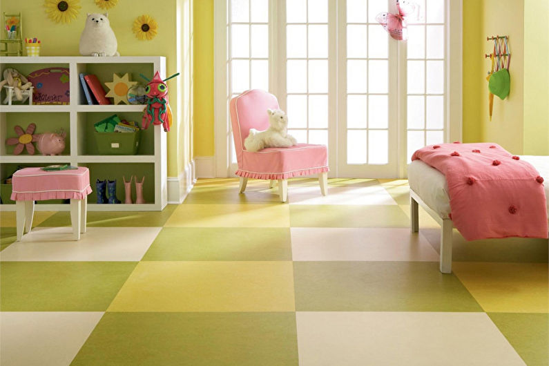 a child's room with yellow and green checkered flooring.