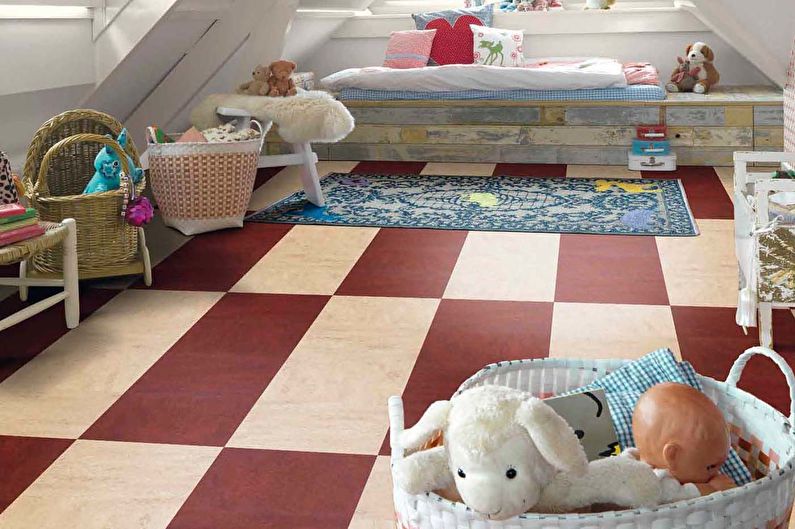 a child's room with a red and white checkered floor.