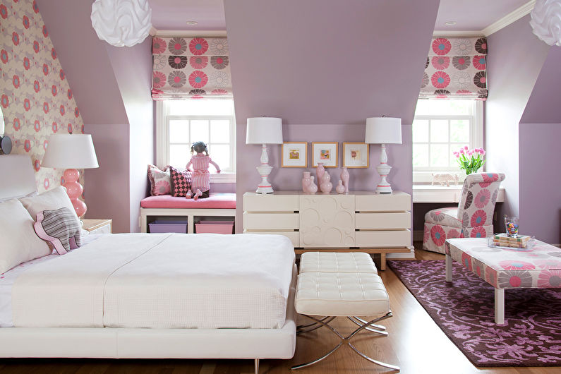 a white bed in a bedroom with pink and purple walls.