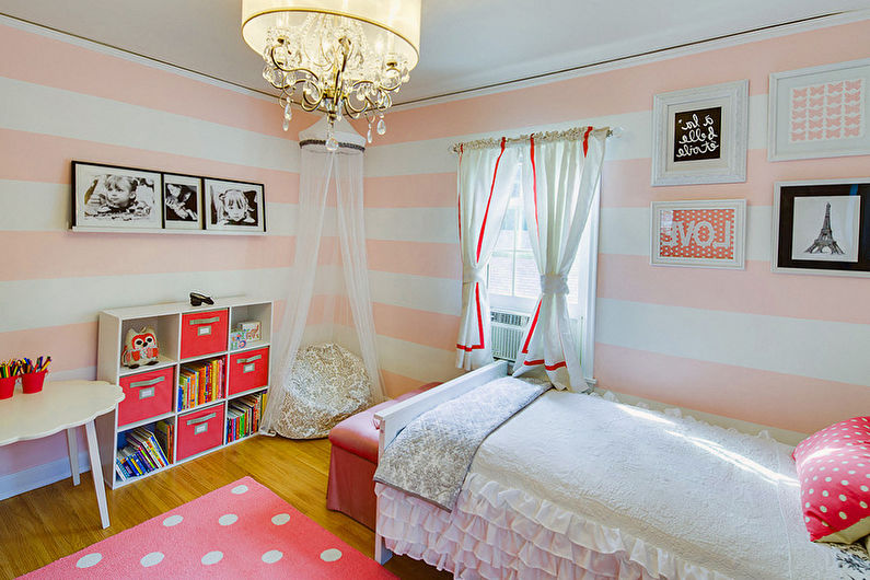 a pink and white striped bedroom.