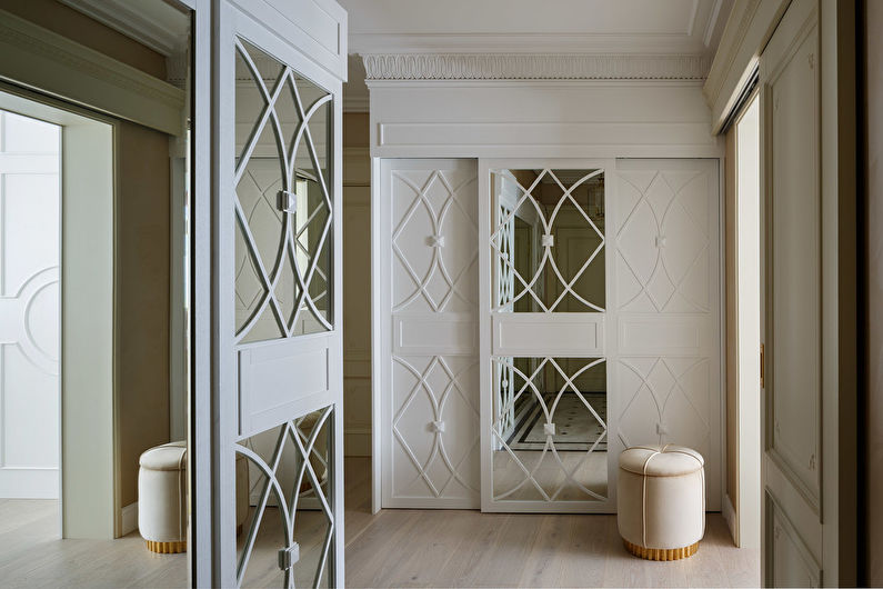 Two pictures of a hallway with a coat rack and hooks.