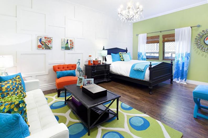 A brightly colored bedroom with blue and green accents.