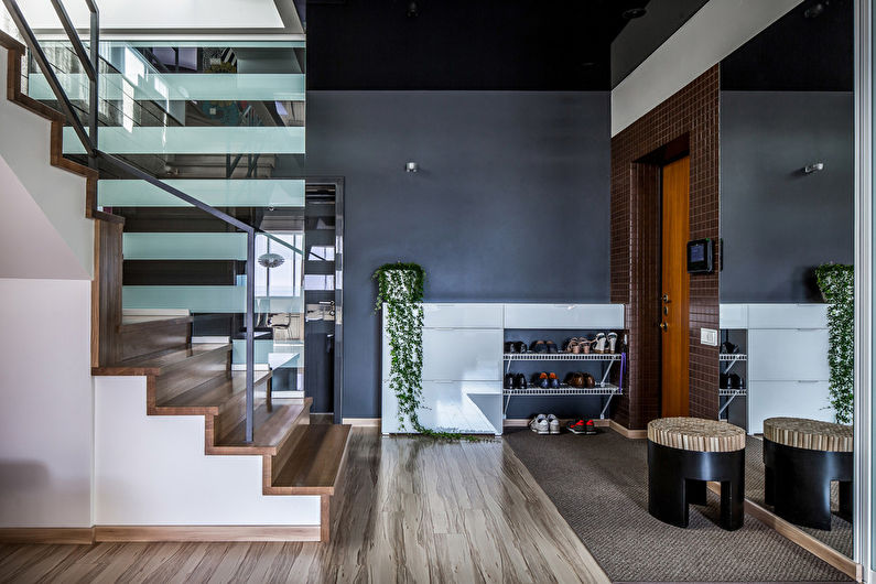 A modern staircase in a living room.