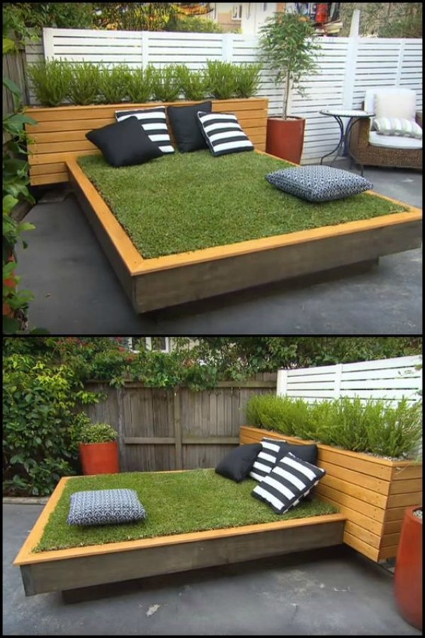 A bed made out of grass in a backyard.