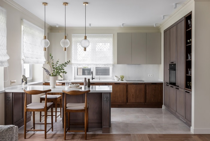 A modern kitchen with wooden cabinets and a center island.