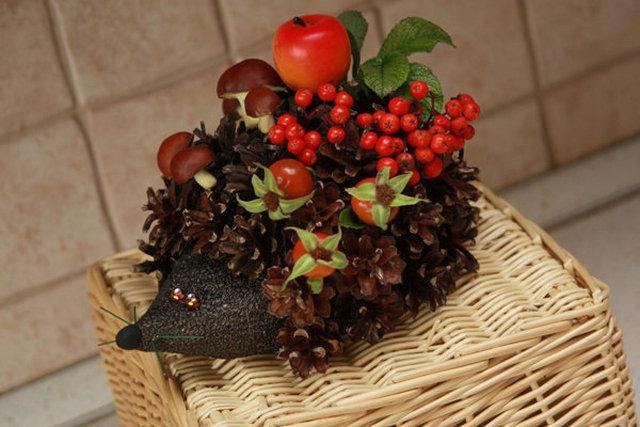 A wicker basket filled with fruit and berries.