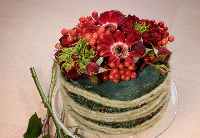 A cake with flowers on top of it.