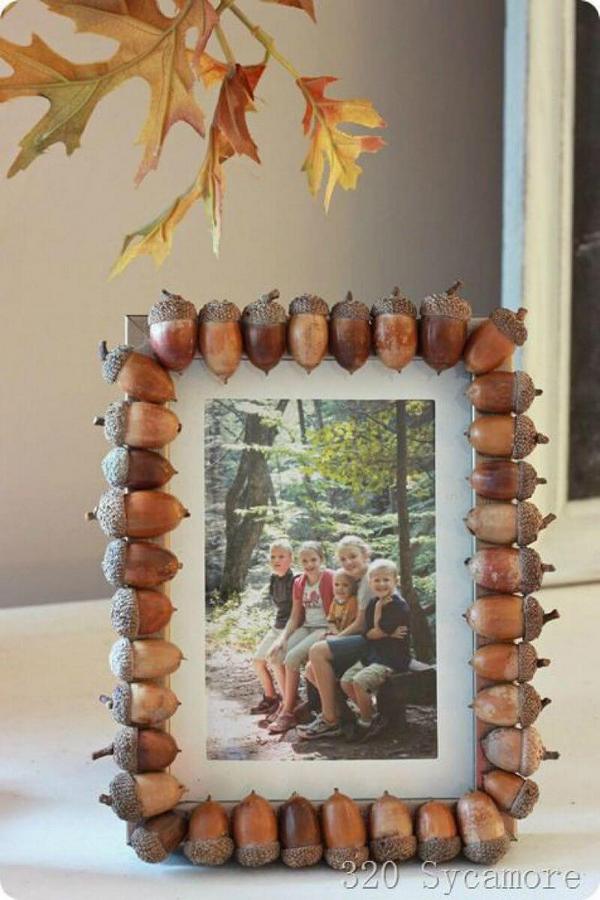 A picture frame made out of acorns.