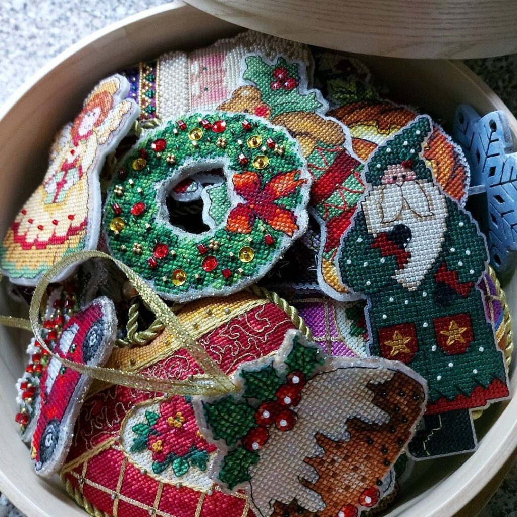 Christmas ornaments in a wooden bowl.