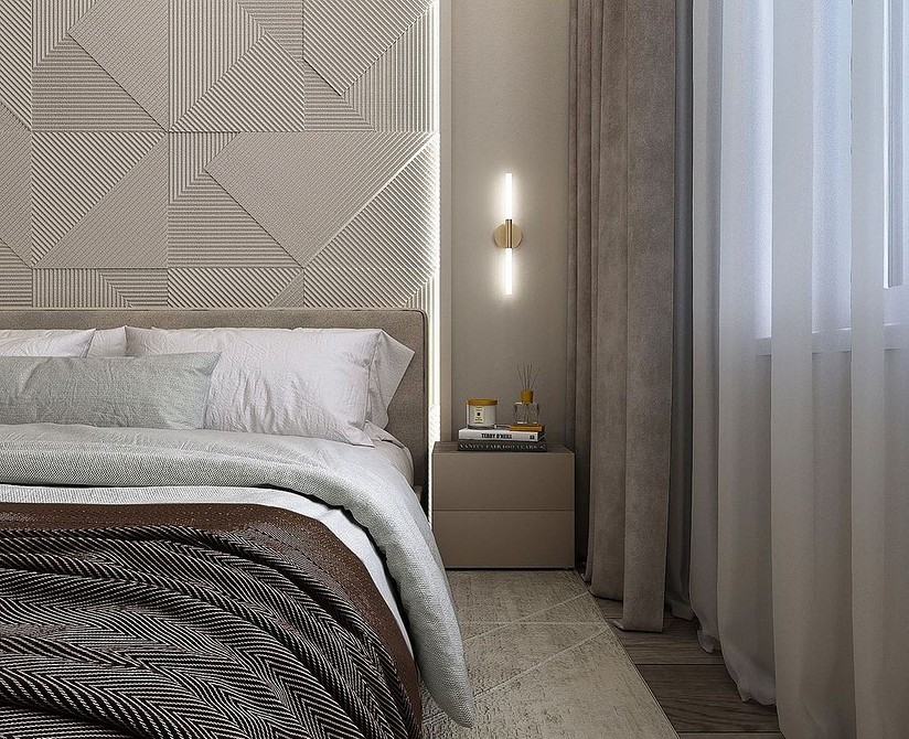 A modern bedroom with beige walls and a white bed.