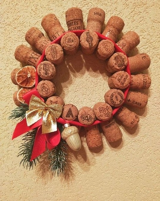 A christmas wreath made out of wine corks.