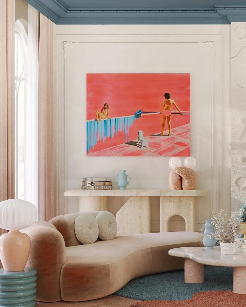 A living room with a painting on the wall.