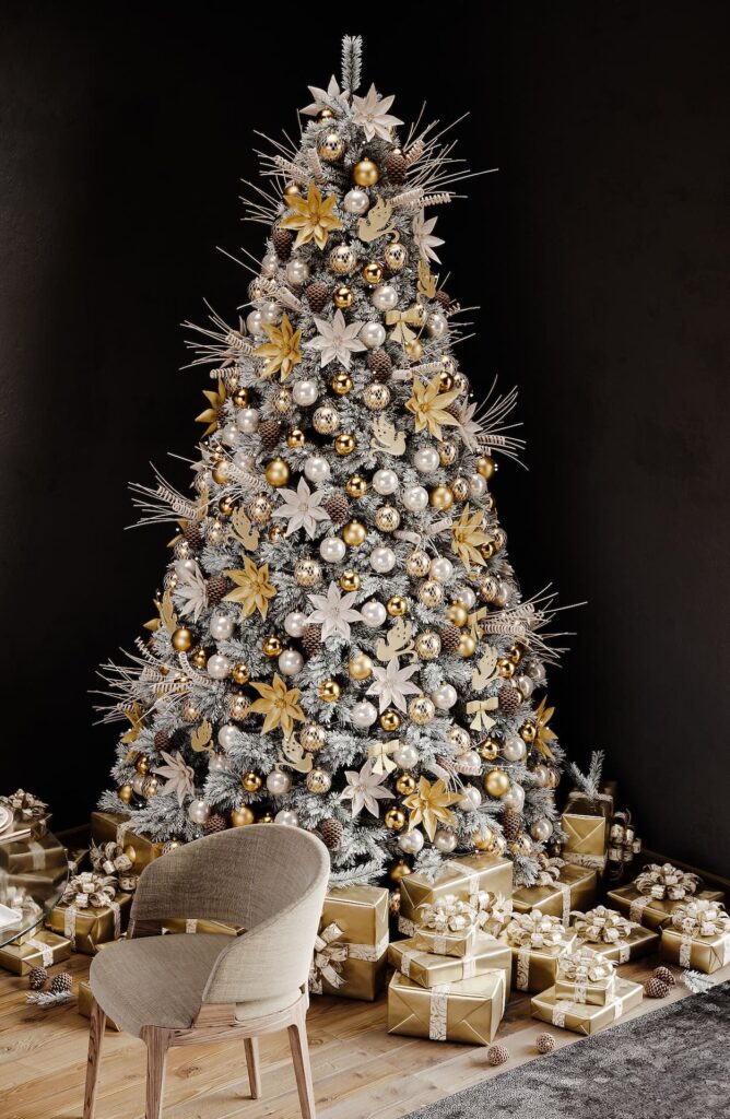 A christmas tree with gold and silver decorations.