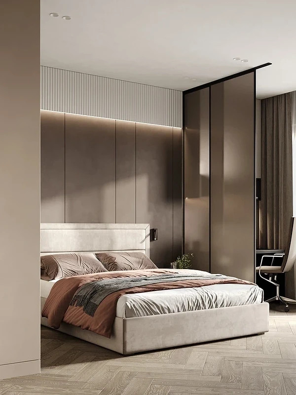 A modern bedroom with beige walls and wooden floors.