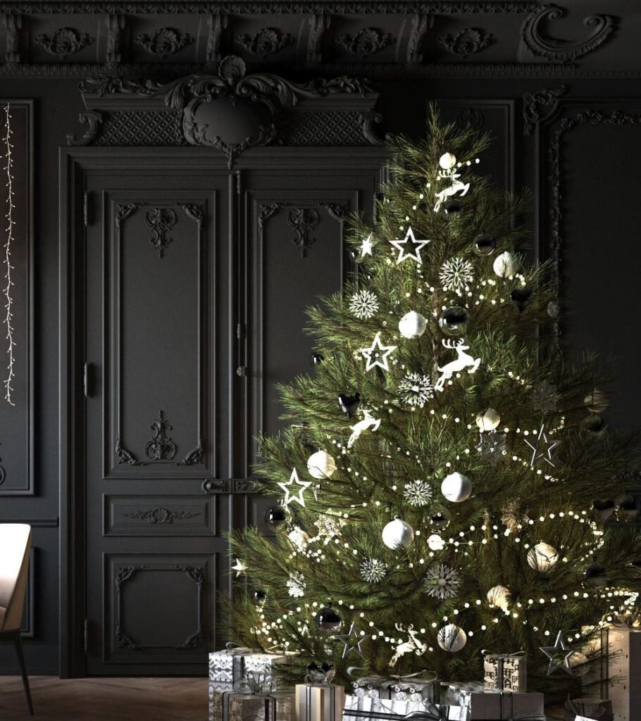 A christmas tree in a black and white room.