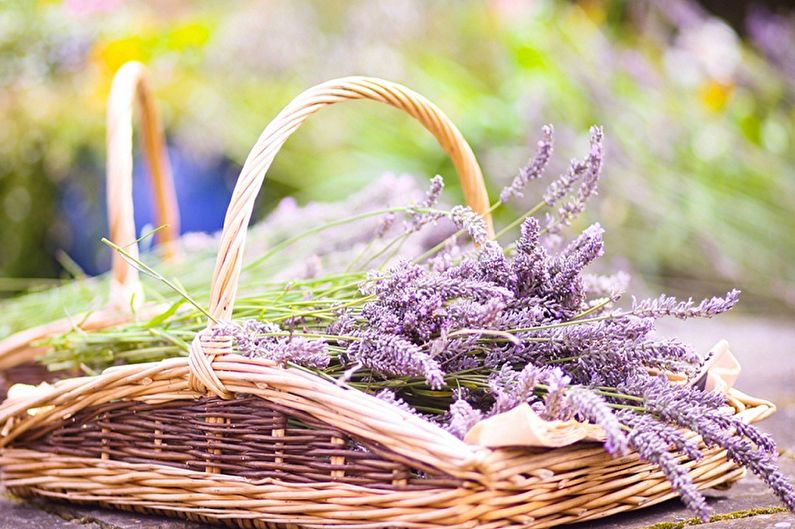 Two wicker baskets with lavender flowers in them.