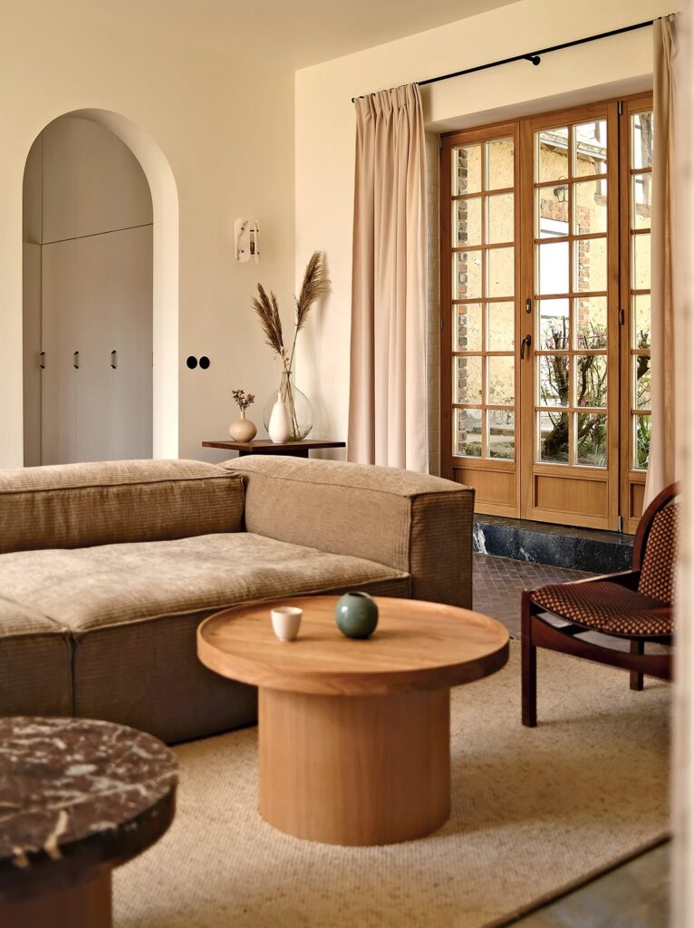 A living room with a couch and a coffee table.