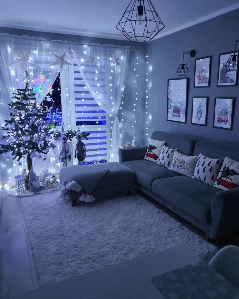 A living room decorated with christmas lights and a christmas tree.