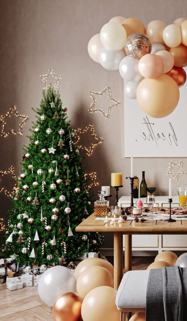 A living room with a christmas tree and balloons.