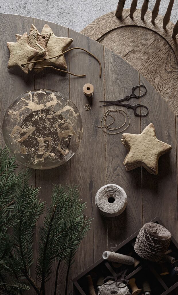 A wooden table with christmas decorations on it.