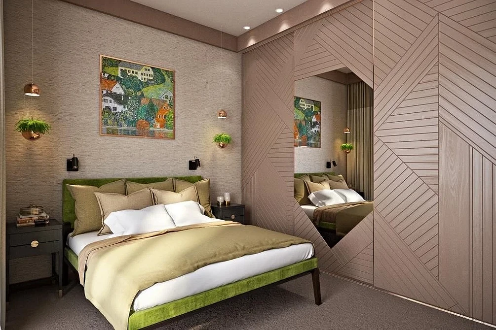 A bedroom with green walls and a green bed.