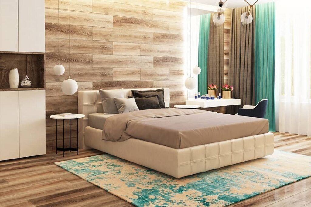 A modern bedroom with wooden walls and a white bed.