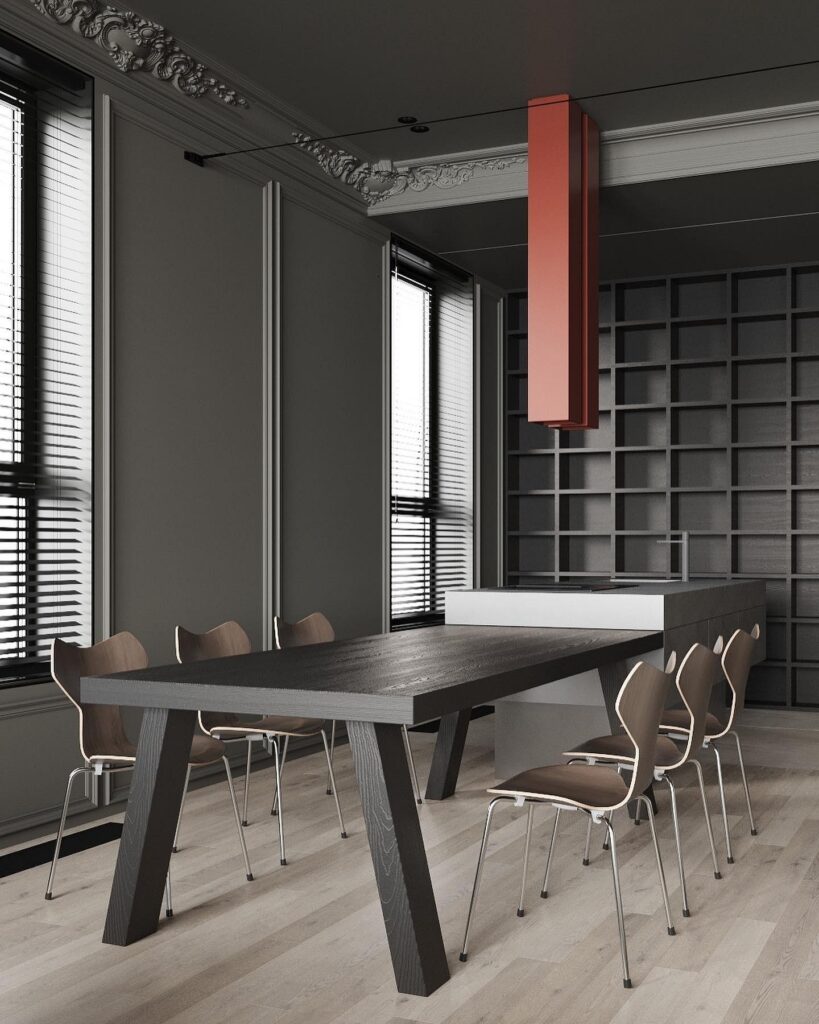 A dining room with a black table and chairs.